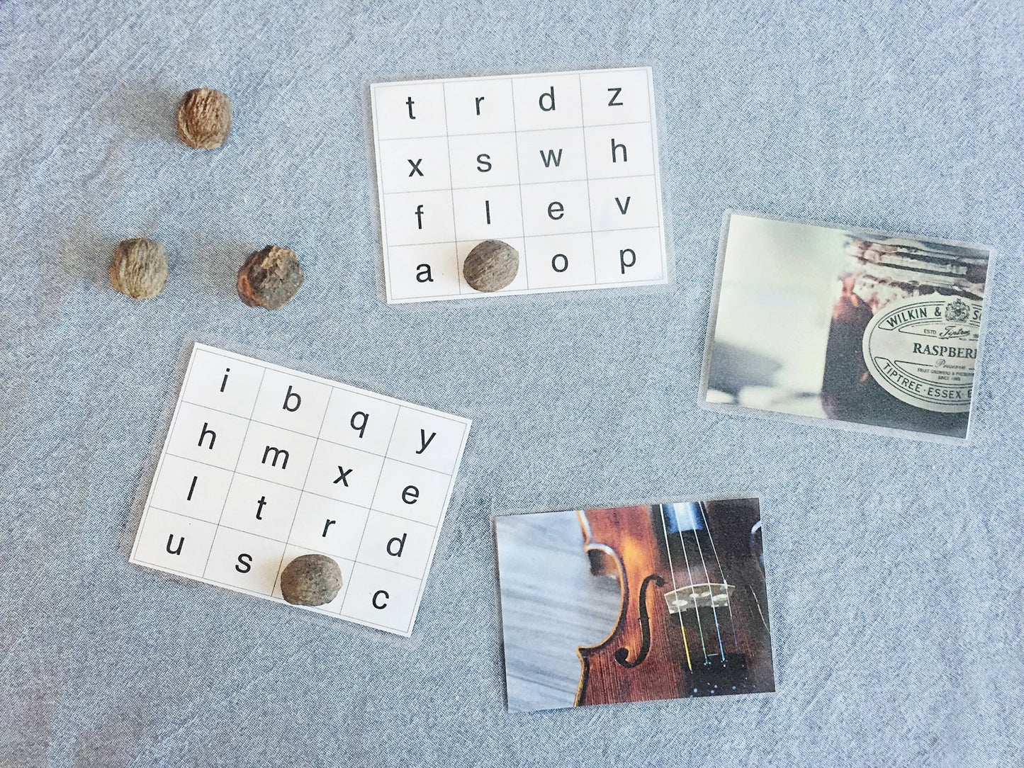 Laminated Phonogram Bingo Cards with picture cards to mark off letters.