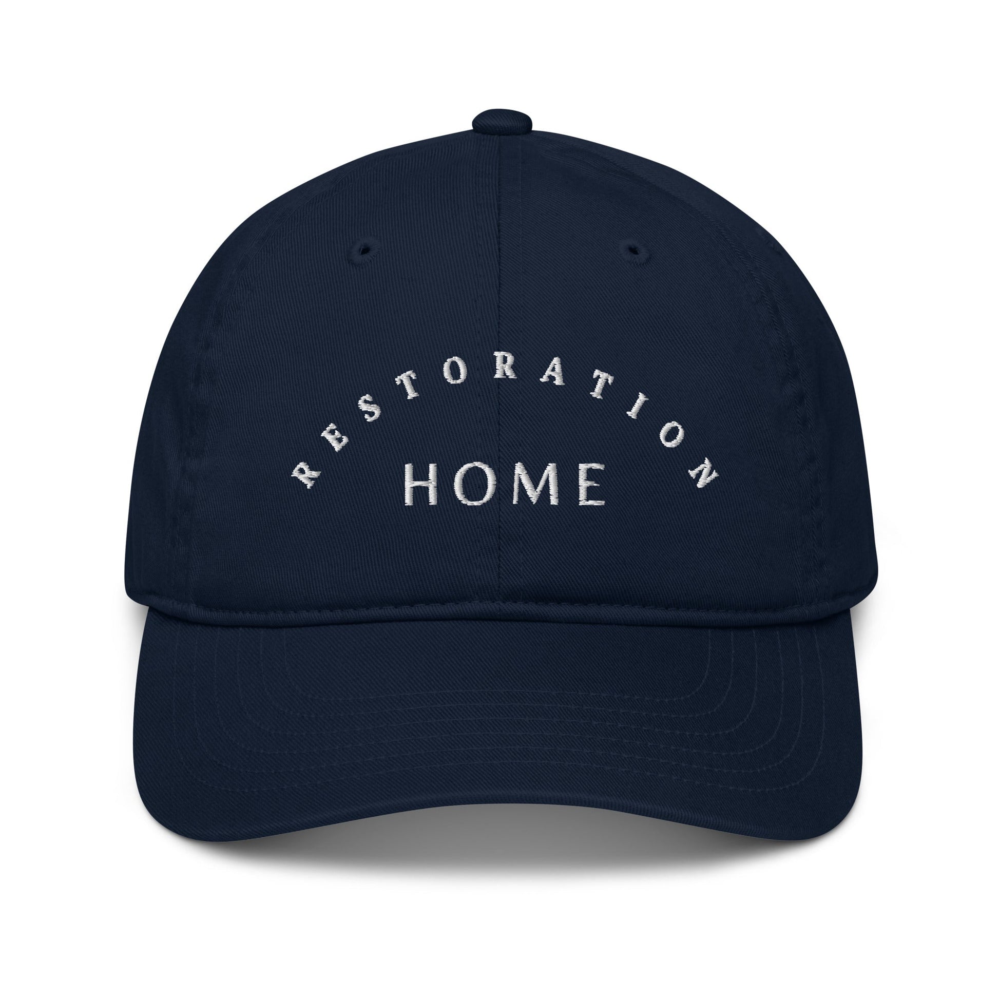 Navy blue dad hat. Restoration home written across the front.