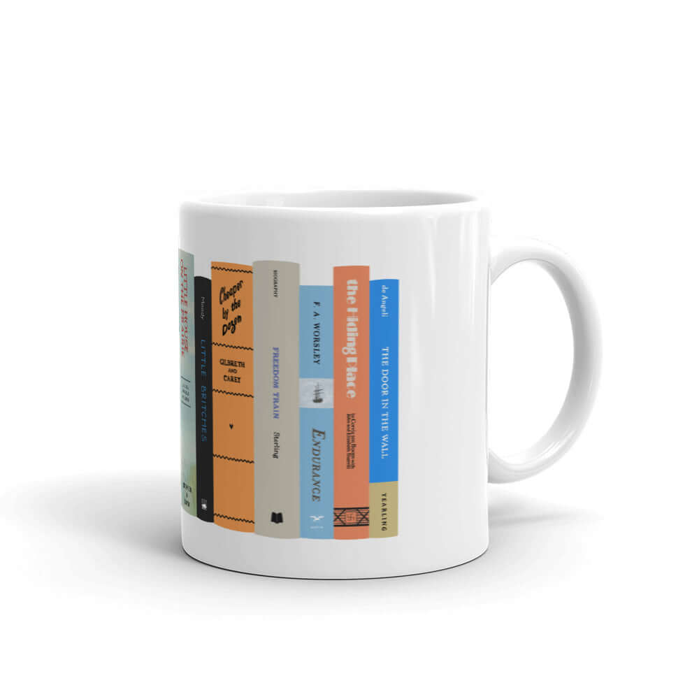 The Peaceful Preschool Mothering By The Book mug in white with a painting of a bookshelf with books on it.